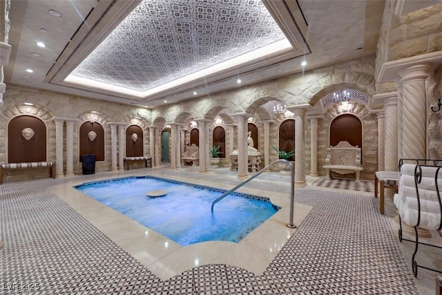 9103 Alta Dr Unit 404, Las Vegas, NV 89145 - view of swimming pool featuring a swimming pool and ornate columns
