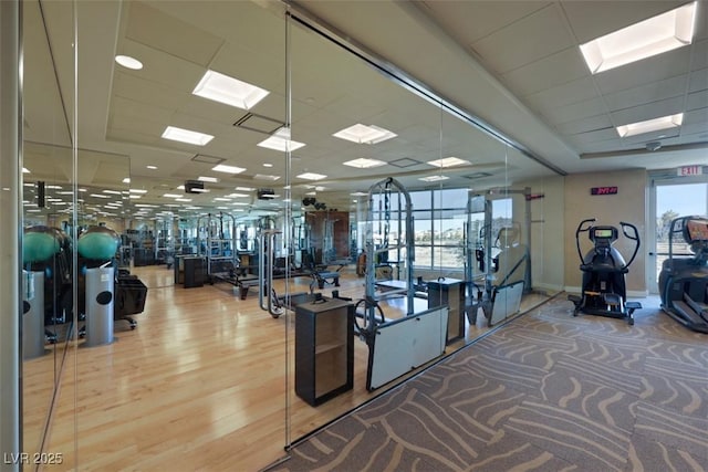9103 Alta Dr Unit 404, Las Vegas, NV 89145 - gym featuring a paneled ceiling and baseboards