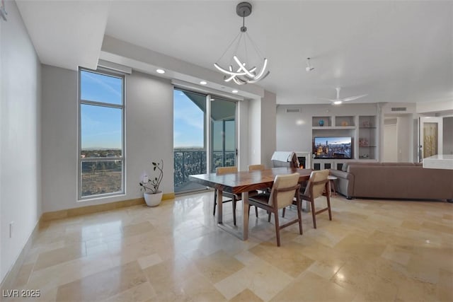 dining room featuring built in features and an inviting chandelier