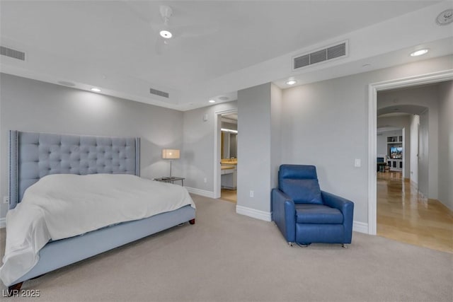 9103 Alta Dr Unit 404, Las Vegas, NV 89145 - carpeted bedroom featuring visible vents, baseboards, and arched walkways