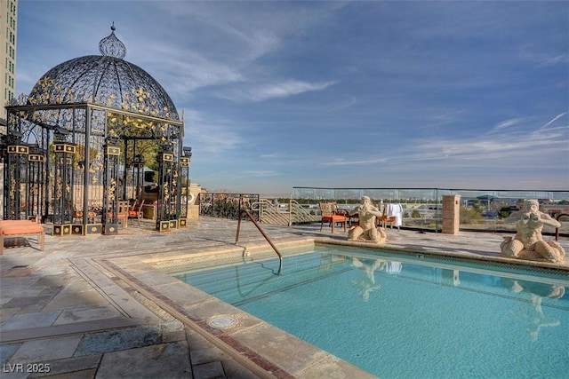 9103 Alta Dr Unit 404, Las Vegas, NV 89145 - pool with a patio area