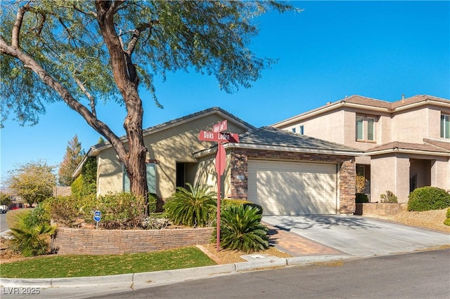 view of front of home with a garage