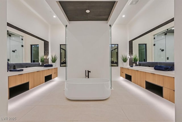 bathroom featuring vanity, tile patterned flooring, and independent shower and bath