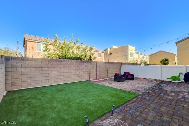 view of yard with a patio area