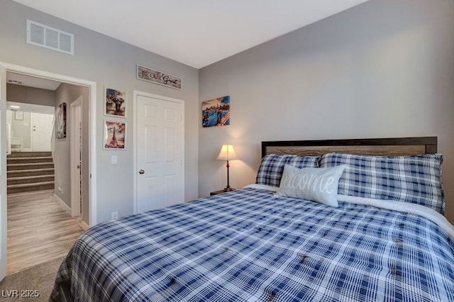 bedroom featuring hardwood / wood-style floors