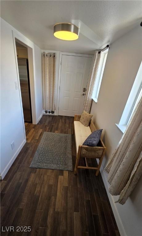 hallway featuring wood finished floors