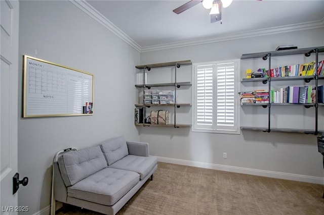 sitting room featuring ornamental molding, ceiling fan, and light carpet