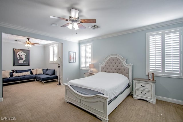 bedroom with light colored carpet, crown molding, and ceiling fan