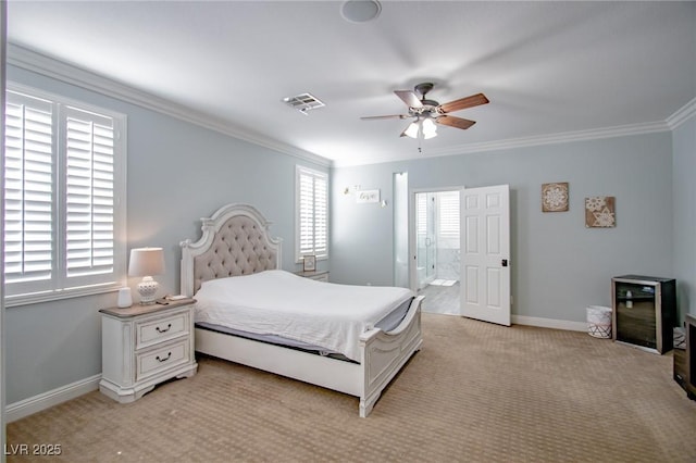 carpeted bedroom with connected bathroom, ceiling fan, and crown molding