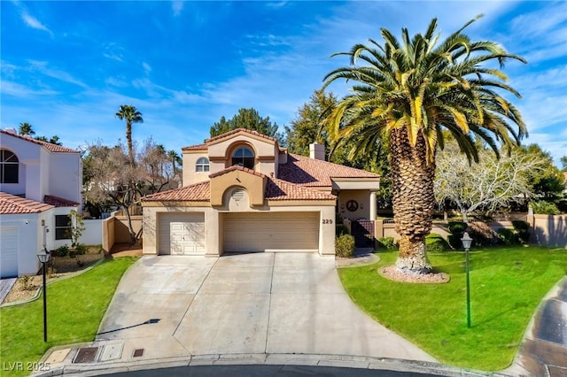 mediterranean / spanish house featuring a tiled roof, concrete driveway, a front yard, and stucco siding