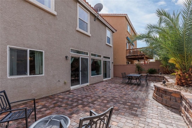 back of house with a patio area