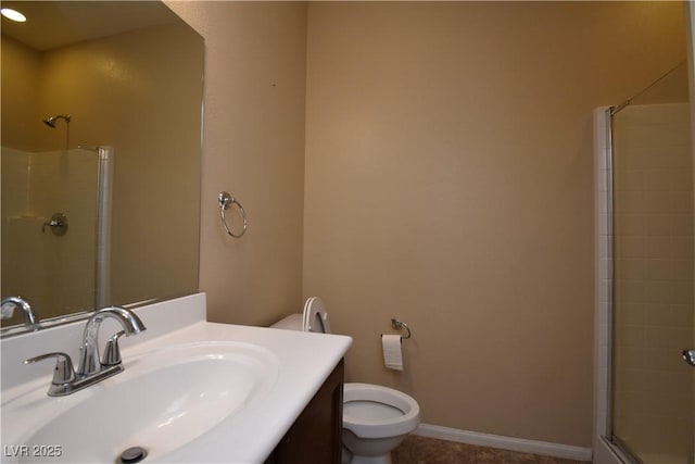 full bath featuring baseboards, an enclosed shower, toilet, vanity, and tile patterned floors