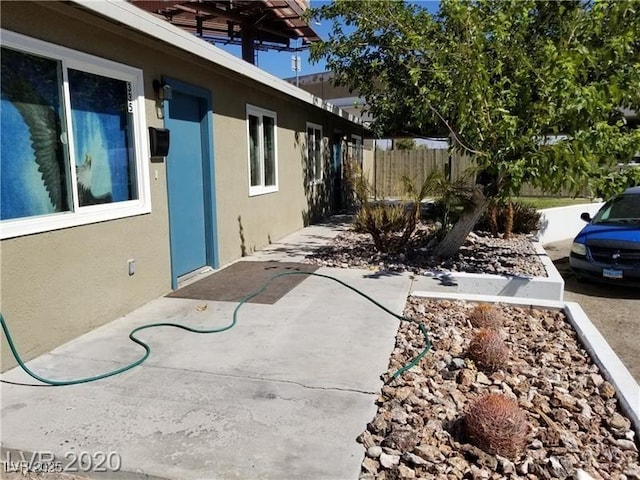 view of patio with fence