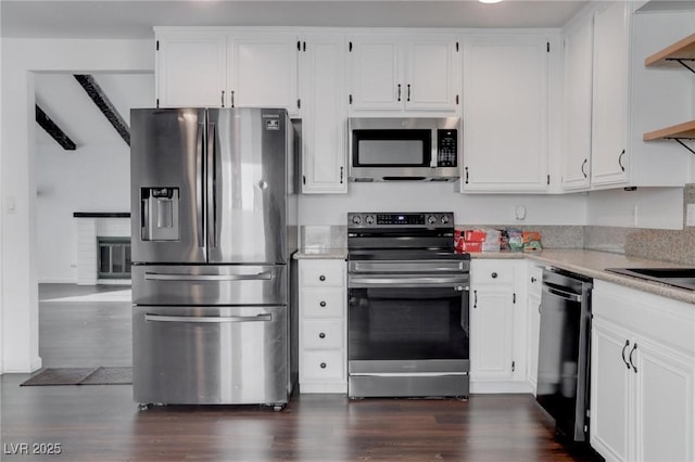 kitchen featuring white cabinetry and appliances with stainless steel finishes