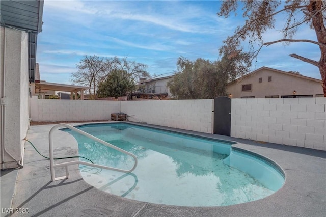 view of pool with a fenced in pool, a gate, and a fenced backyard