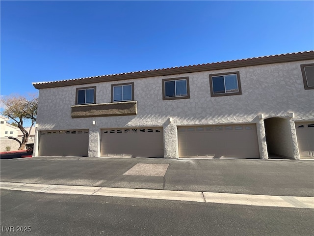 view of property featuring stucco siding