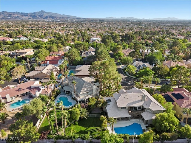 bird's eye view with a residential view and a mountain view