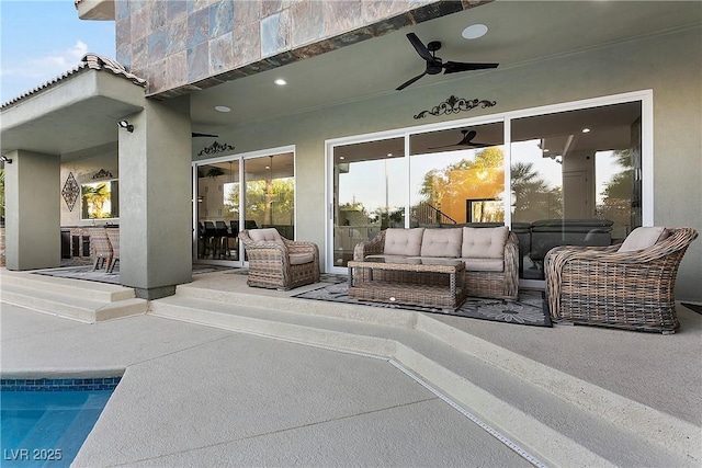 view of patio / terrace featuring a ceiling fan and an outdoor hangout area