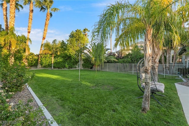 view of yard with a fenced backyard