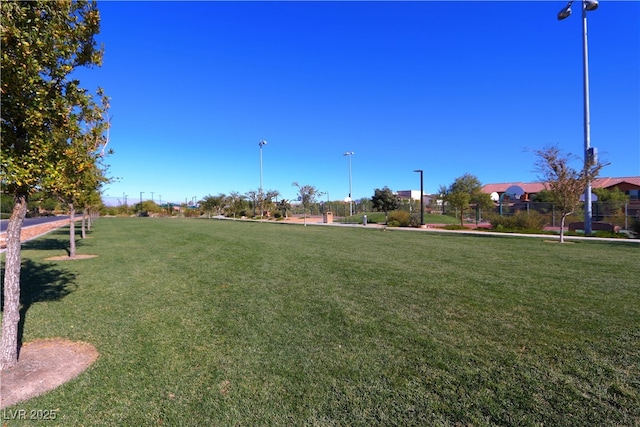 view of home's community featuring a yard