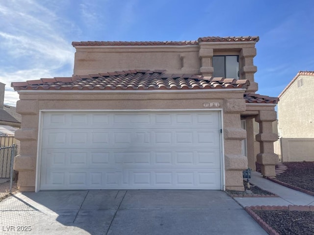 garage featuring driveway