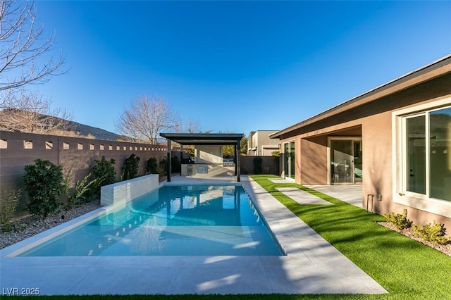 view of swimming pool featuring a patio area, a fenced backyard, and a fenced in pool