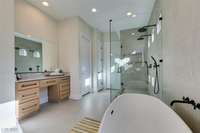 full bath with recessed lighting, a shower stall, a freestanding bath, and vanity