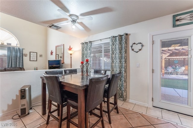 2245 Saint Paul Way, Las Vegas, NV 89104 - dining space with light tile patterned floors, visible vents, and a ceiling fan