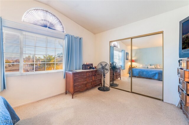 2245 Saint Paul Way, Las Vegas, NV 89104 - bedroom featuring lofted ceiling, a closet, and light colored carpet