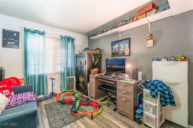 2245 Saint Paul Way, Las Vegas, NV 89104 - interior space with light wood-style floors and radiator heating unit