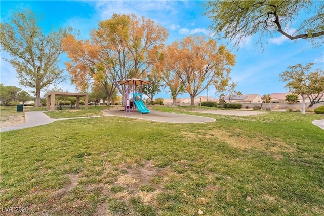 community play area with a lawn