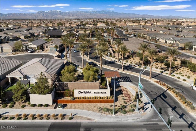 aerial view with a mountain view and a residential view