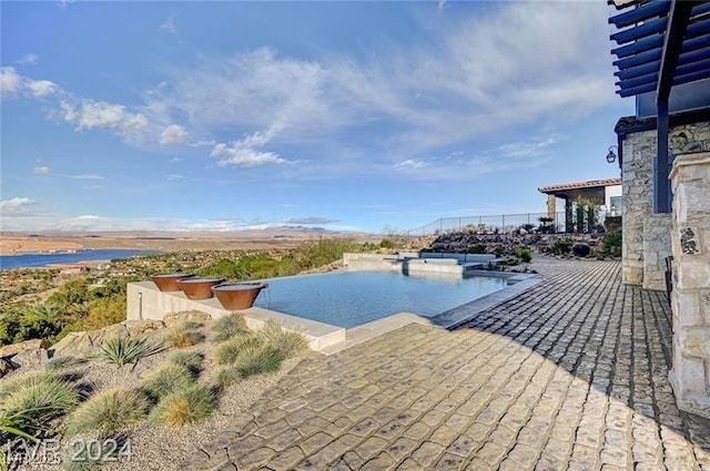 view of pool with a patio