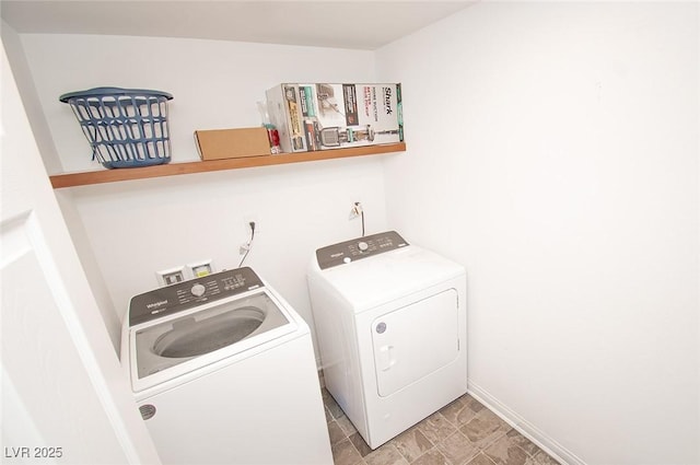 laundry room featuring laundry area and washer and clothes dryer