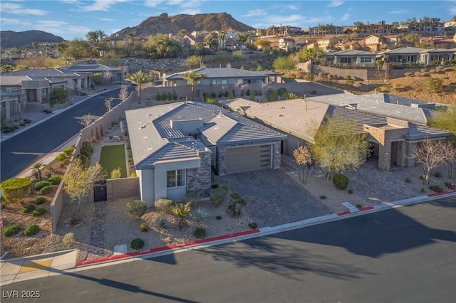 aerial view with a residential view and a mountain view