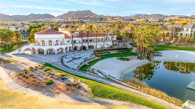 bird's eye view with a residential view and a water and mountain view