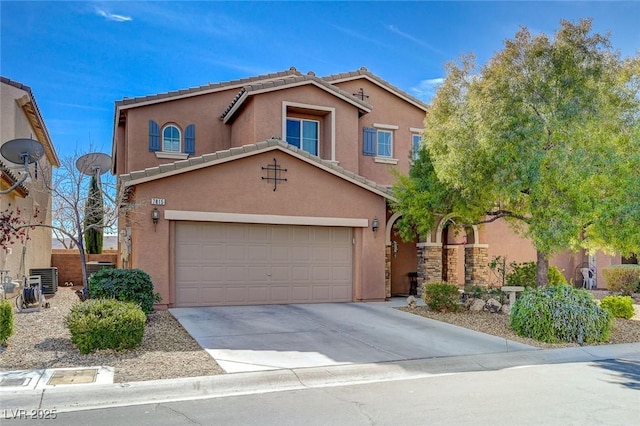 view of front of home with a garage, central AC, a tile roof, concrete driveway, and stucco siding