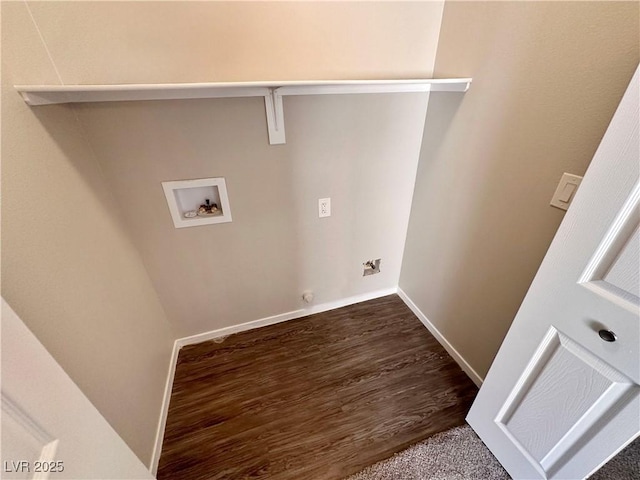 laundry area with gas dryer hookup, baseboards, washer hookup, and wood finished floors