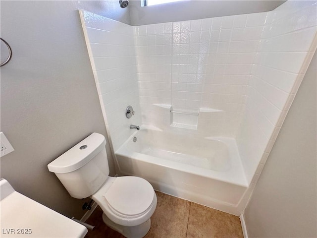 full bath featuring tile patterned flooring, shower / bath combination, and toilet