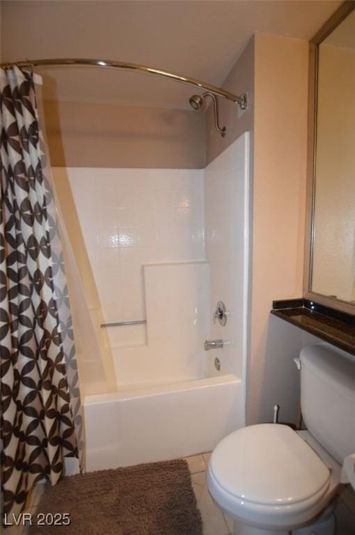 bathroom featuring toilet, shower / tub combo, and tile patterned flooring