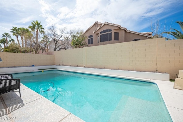 view of swimming pool with a fenced backyard and a fenced in pool