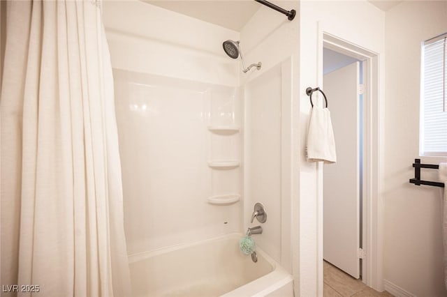 bathroom with shower / tub combo with curtain