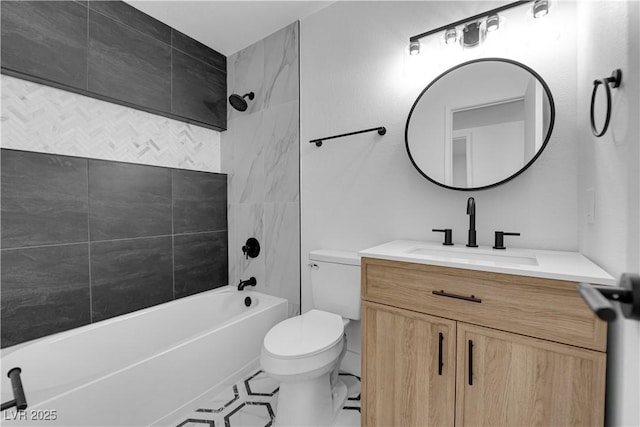 bathroom featuring bathtub / shower combination, vanity, and toilet