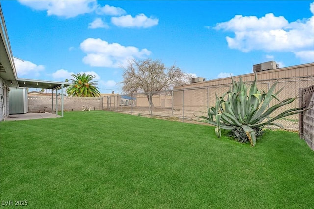 view of yard with a fenced backyard