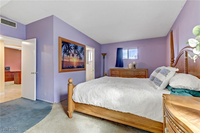 bedroom featuring visible vents and carpet floors