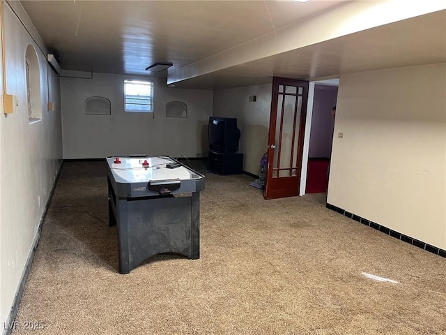 game room featuring carpet floors and baseboards