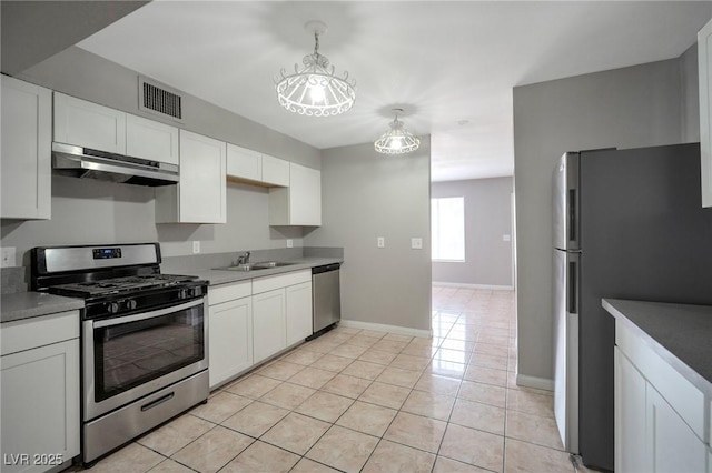 kitchen with under cabinet range hood, visible vents, appliances with stainless steel finishes, and white cabinets