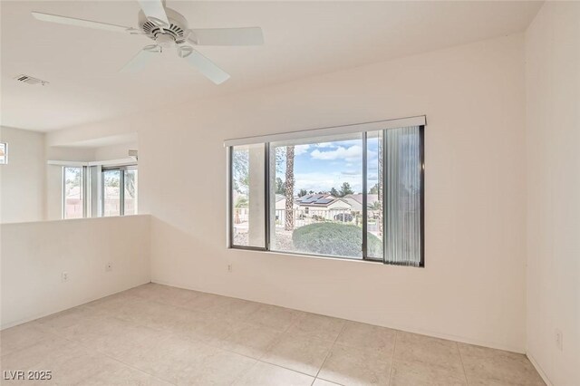 538 Cypress Gardens Pl, Henderson, NV 89012 - unfurnished room featuring visible vents, a ceiling fan, and light tile patterned flooring