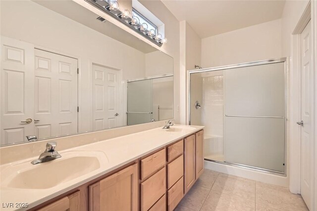 538 Cypress Gardens Pl, Henderson, NV 89012 - full bathroom with a stall shower, a sink, and tile patterned floors