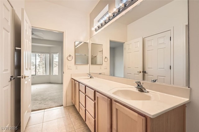 538 Cypress Gardens Pl, Henderson, NV 89012 - bathroom featuring double vanity, tile patterned flooring, and a sink